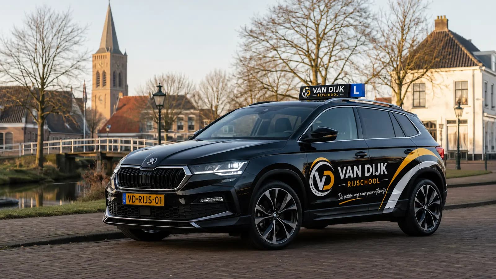 Zwarte Van Dijk Rijschool-lesauto in een herkenbaar straatbeeld bij Wateringen
